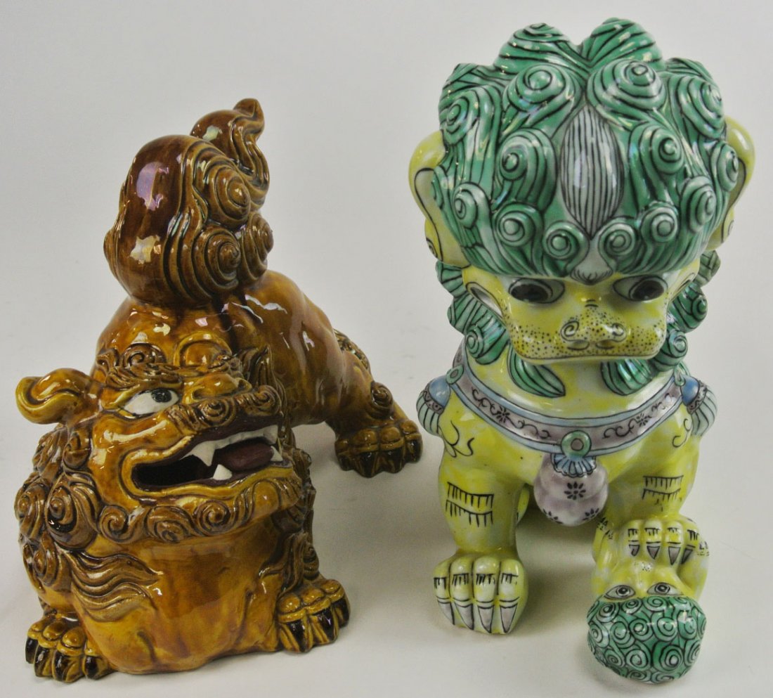J34-12 TWO FOO DOGS: Tallest measures 9 1/2". Estimate $30- 40. Starting Bid $10.