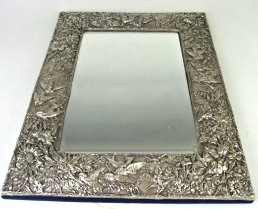 J87-47 STERLING SILVER SELF STANDING MIRROR: Hallmarked JR 925. Marked on back "Sterling Silver Made in USA". Measures 19 1/2" x 15 1/4". Estimate $2,500 - $3,000 Starting Bid $800