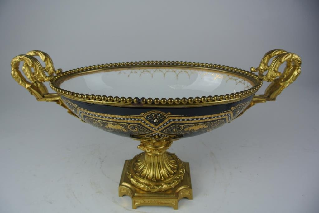 J99-25 19TH CENTURY BRONZE SEVRES CENTERPIECE: Measures 9 1/2" x 16 3/4" x 8". Estimate $2,000- 4,000. Starting Bid $1,200.