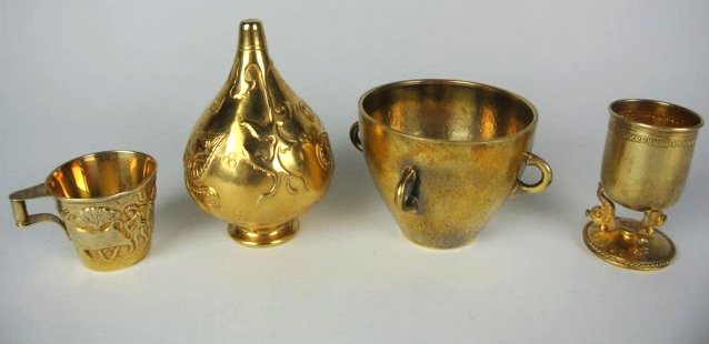 J99-51 FOUR 925 SILVER GOLD WASHED PIECES: All Marked "LLAS LALA OUNIS GREECE". Bowl, 2 cups and a topper. Bowl measures 3 1/4" tall x 4" diameter. Estimate $500- 800. Starting Bid $250.