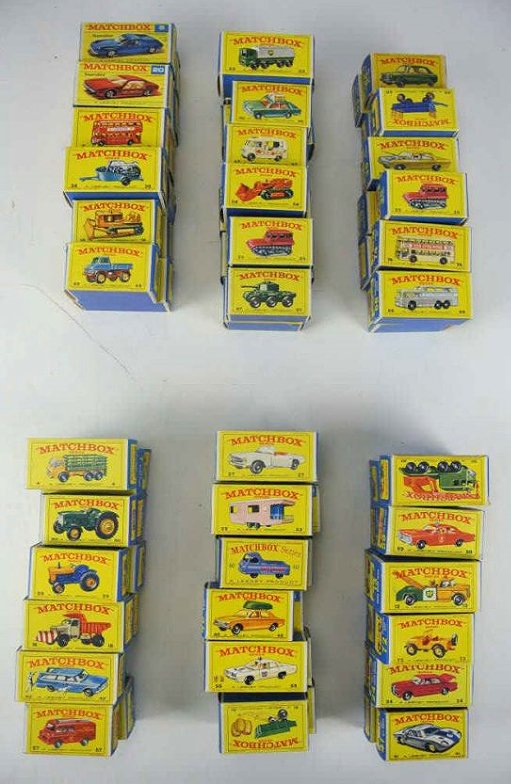 F72-5 SEVENTY-TWO MATCHBOX VEHICLES: Cars, trucks, tractors, trailers and more. Includes Catalogs from 1968 (14) and 1969 (16) and 8 empty car boxes. Estimate $2,000- 3,000. Starting Bid $475.