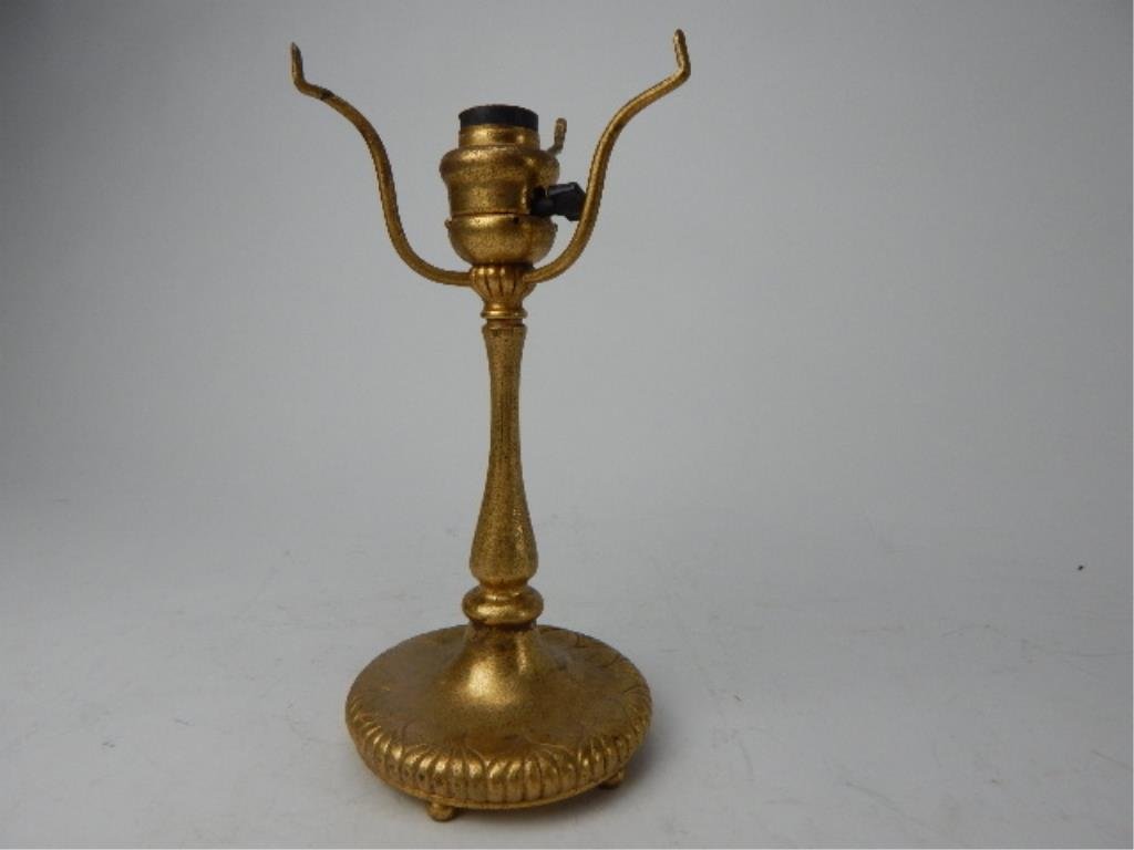 A45-6 TIFFANY STUDIOS DORE BRONZE LAMP BASE: Signed and numbered 322 on bottom (see picture). Measures 11". Estimate $800 - $1,200 Starting Bid $600