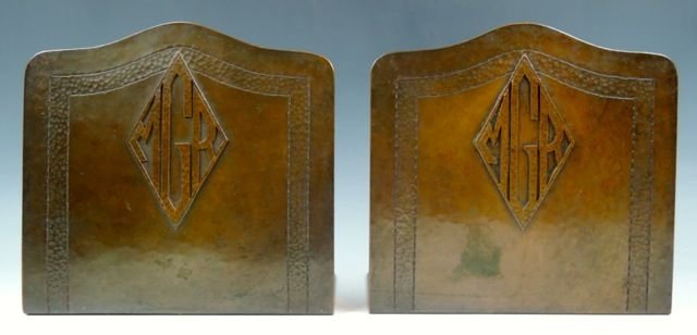 A44-55 PAIR OF DIRK VAN ERP COPPER BOOKENDS: Hand hammered copper, both signed with windmill mark, and monogrammed MGR. Measures 5 3/4" x 6". Estimate $400 - $600 Starting Bid $200
