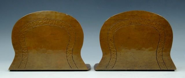 A44-62 PAIR OF SIGNED DIRK VAN ERP COPPER BOOKENDS: Hand hammered copper with great patina. Measures 3 1/2" x 5". Estimate $400 - $600 Starting Bid $200