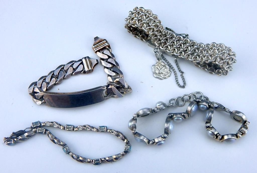 J65-62  FOUR STERLING SILVER BRACELETS (1 of 6)