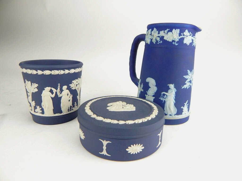 K13-106 WEDGWOOD CUP, COVERED DISH & PITCHER: Cup measures 3 1/2", round covered dish 1 1/2" x 4" diameter, and pitcher 5 1/2". Estimate $100 - $200 Starting Bid $10