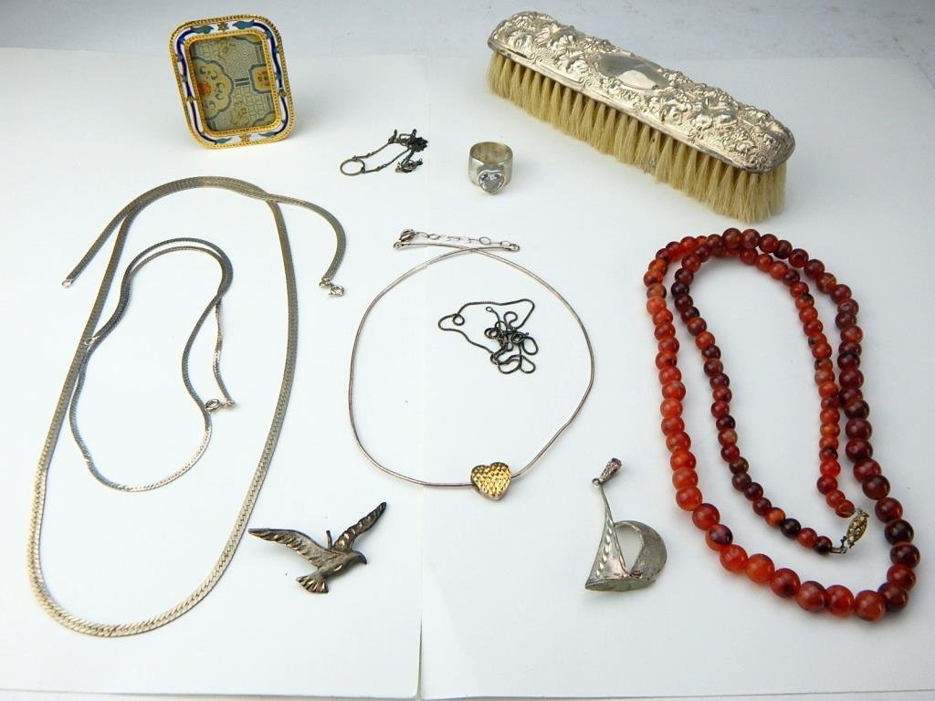 J65-40 STERLING JEWELRY, BRUSH, FRAME & NECKLACE: Total of ten pieces including sterling ring with heart stone, sterling bird pendant, sterling sailboat pendant, and five sterling chain necklaces, amber bead necklace, miniature frame, and vintage bru