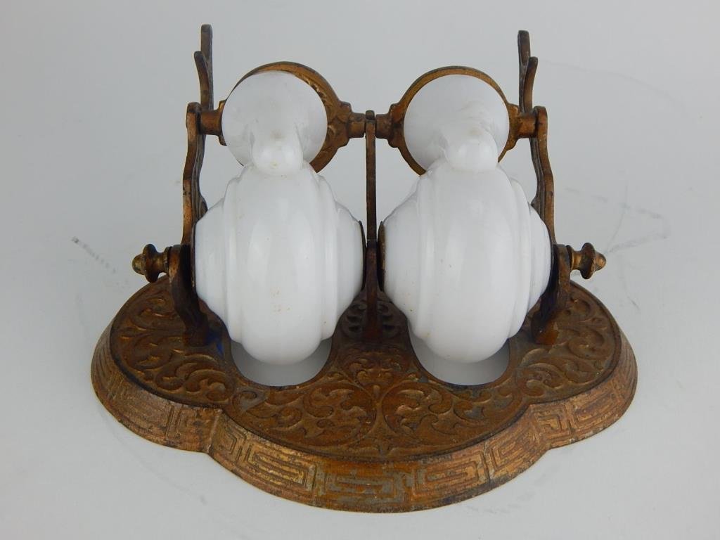 A20-13 CIRCA 1890 MILK GLASS SNAIL INKWELLS: Has a pen holder, measuring 3" x 7" x 5". Chip on rim, sold AS IS. Estimate $100 - $200 Starting Bid $40