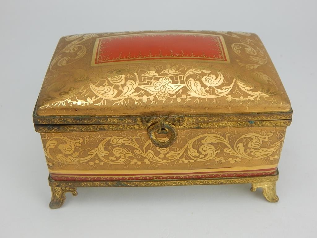 K13-44 LIMOGES PORCELAIN BOX: Signed "Limoges France", with artist mark and reads "Geove Freint et dore entierement a la wain for le tallee in Paris France". Measures 3" x 5 1/2" x 3 3/4". Estimate $300 - $400 Starting Bid $100