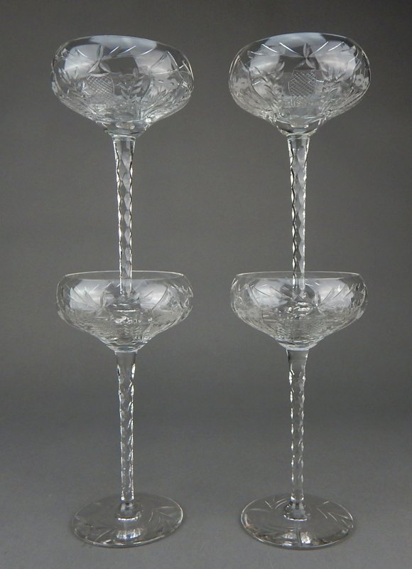 Four Crystal Stemmed Liquor Glasses: Measuring 6 1/4". Estimate $100 - $200 Starting Bid $10