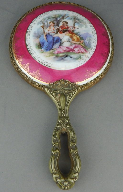 Royal Vienna Style Porcelain Hand Mirror: Measures 9 1/4" x 5 1/4". Estimate $200 - $300 Starting Bid $20