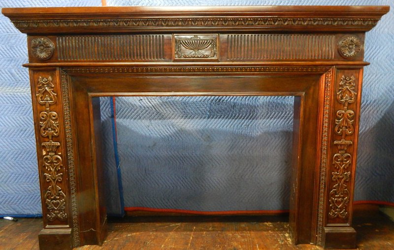 Carved Mahogany Fireplace Surround / Mantel: Overall measures 50" x 72" and opening is 33 1/4" x 43 1/4". Estimate $400 - $500 Starting Bid $50