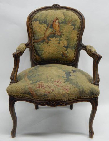 Antique Carved Wood Needlepoint Chair: Measures 36" tall x 25" wide x 21" deep. Estimate $200 - $300. Starting bid $30