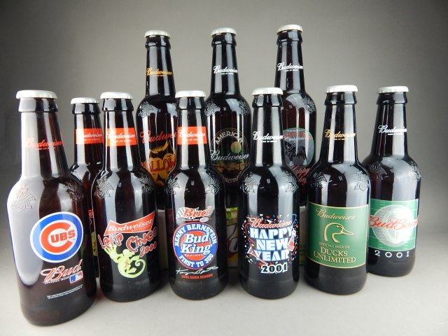 Ten Budweiser 60 ounce Promotional Bottles: Measures 14 3/4". Estimate $100 - $300 Starting Bid $20