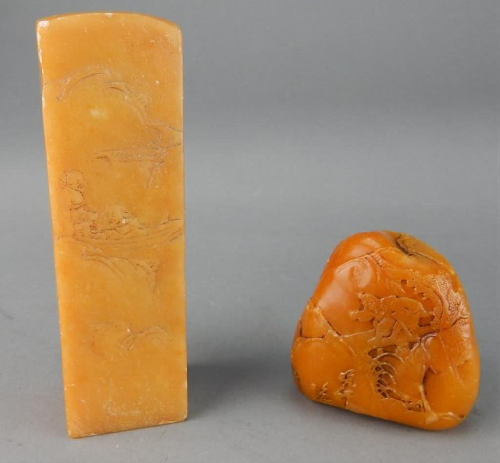 Two Yellow Soapstone Carvings: One is a stamp Measures 5" tall x 1 1/2" x 1 1/2", and carving measures 2 1/2" tall. Estimate $200 - $300. Starting bid $50.