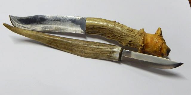 Two Old Knives with Carved Bone Handles: Both measure 8 1/2" long, one handle has carved tiger head on the tip. Estimate $100 - $200 Starting Bid $10