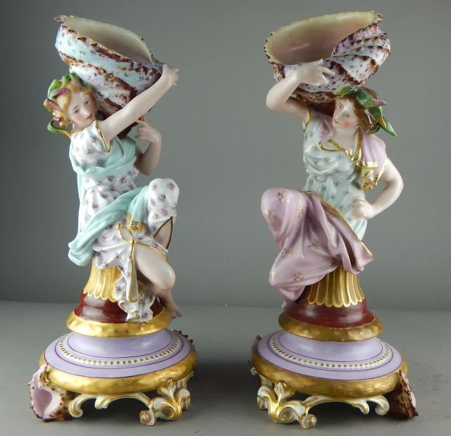 Pair of Tall Porcelain Girls Holding a Seashell: Hand painted, unmarked and measure 18". Estimate $300 - $500 Starting Bid $30