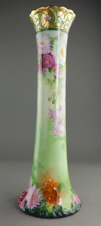 Tall T & V Limoges France Porcelain Vase: Hand painted flowers and heavy gold accents with makers mark on bottom and measures 16". Estimate $200 - $300 Starting Bid $20