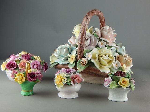 Capodimonte & England Porcelain Flower Baskets: Total of five including Capodimonte 10" x 14", two Ansley Bone China England 4" x 7" x 5" and 3 1/2" x 4" x 3 1/2", two Crown Staffordshire England 4" x 4" x 3" and 3 1/2" x 3 1/2". Estimate $100 - $2