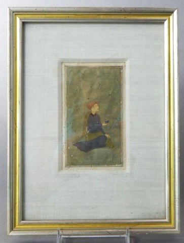 Mughal Miniature Painting on Paper: 17th or 18th Century Indian Mughal miniature painting, image measures 6" x 3 1/2" and 12" x 9" with frame, some bug holes in paper. Estimate $300 - $500 Starting Bid $50