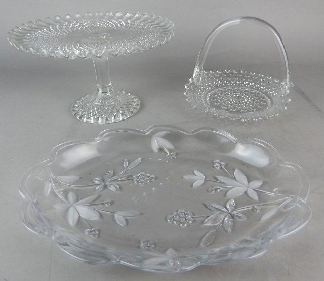 Crystal "Hors d'oeuvres" Plates & Cake Plate: Small cake plate measures 5" tall x 8 1/2" Diam. Plate with handle measures 5 1/2" tall x 7 1/4" x 6". Tray measures 11" x 7 1/2". Estimate $200 - $300. Starting bid $10.