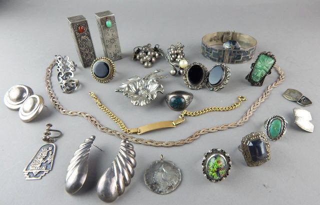Collection of Sterling Jewelry: 28 pieces. Rings, earrings, brooches, lipstick holders, necklace, bracelet, etc. Estimate $100 - $150 Starting Bid $20