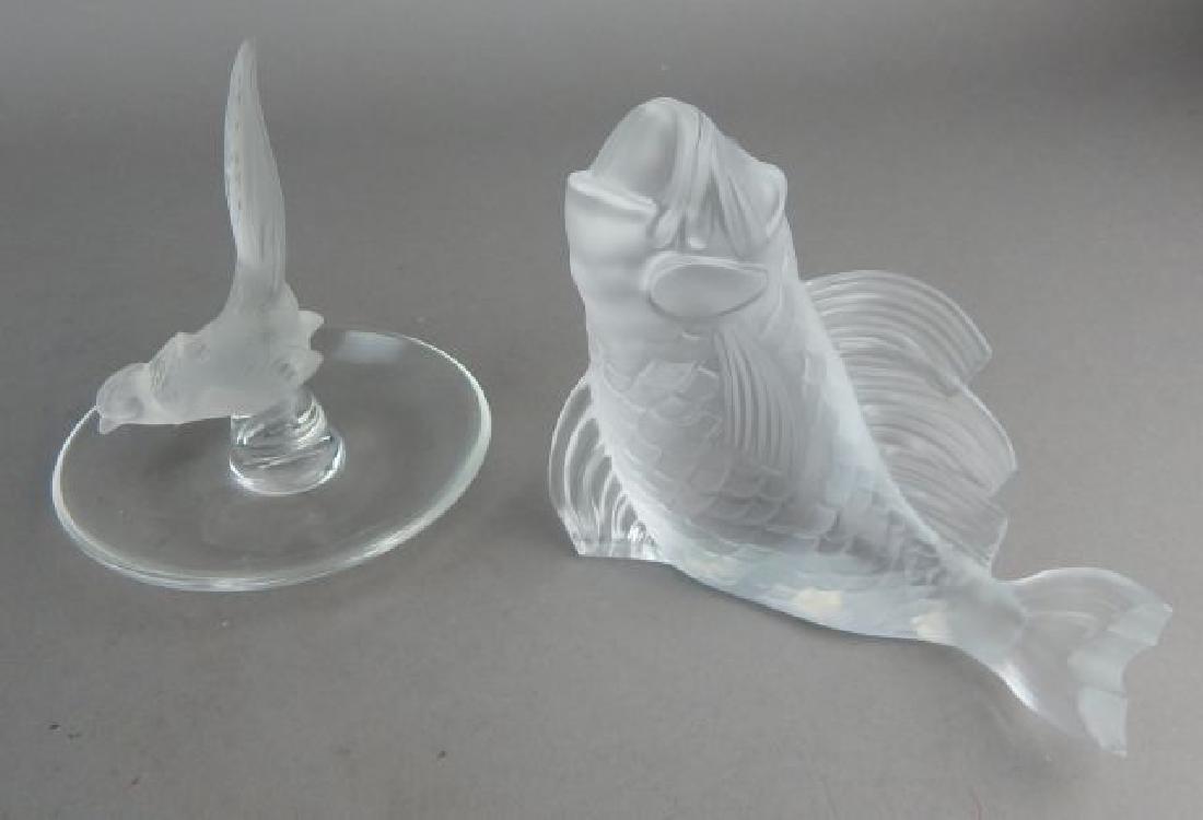 Lalique Fish and Ring Holder: Tail chipped on fish. Measures 4" tall x 5" long. Ring holder measures 4" tall. Estimate $100 - $200. Starting bid $30.
