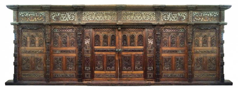Heavily carved Indonesian teak entryway wall: Heavily carved Indonesian teak entryway with wall. Double Doors are 76"h x 69"w Overall 109" high, 24'4" long.