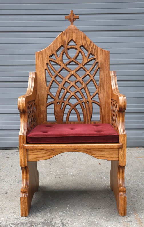 Gothic Style Throne Chair: Gothic style throne chair for clergy, pierce carved in organic shapes and topped with a cross. Seat is in a velveteen red fabric. 54"H x 26"W x 21"D