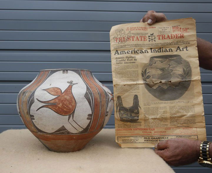 Native American Zia Pueblo Pottery Vase: Zia Pueblo pottery vase decorated with a road runner like bird. Comes with news paper article provenance. 11 1/4"h. Top opening is 6 3/4"dia. Overall width is 13.5"w