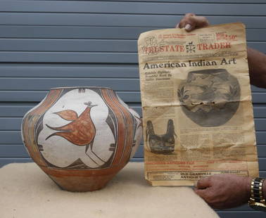 Native American Zia Pueblo Pottery Vase: Zia Pueblo pottery vase decorated with a road runner like bird. Comes with news paper article provenance. 11 1/4"h. Top opening is 6 3/4"dia. Overall width is 13.5"w