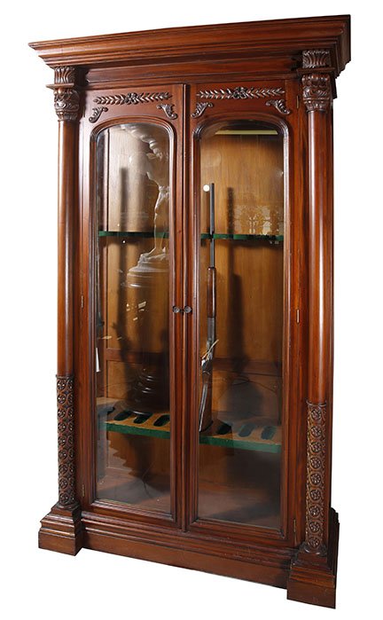 Mahogany Gun Cabinet: Two door mahogany gun cabinet with beveled glass. Holds 12 long guns. 7' 5"H x 33"W x 32"D