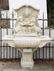 Cast stone wall fountain with 2 babies