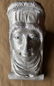 Cast corbel in the form of a head from a Cincinnati