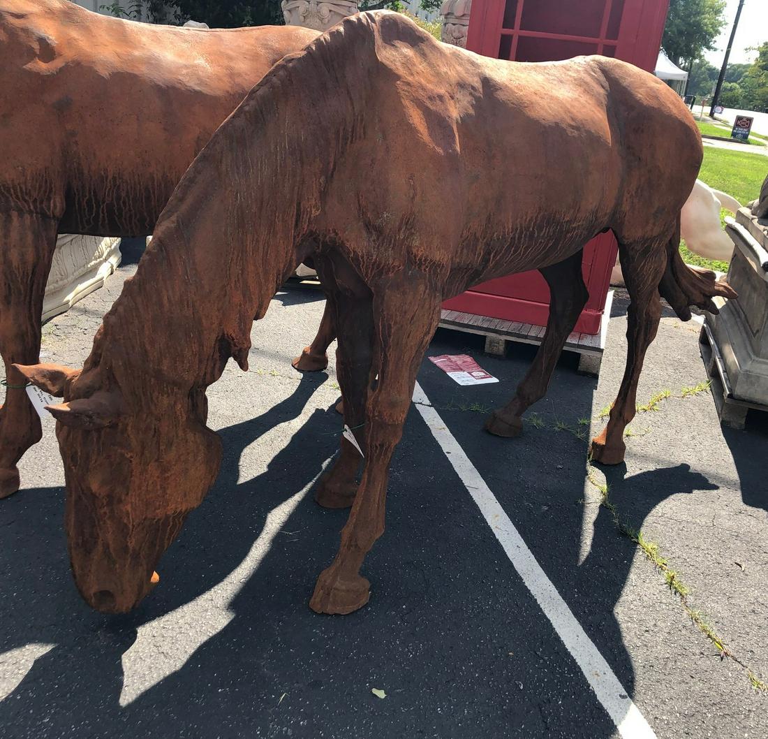 Cast Iron Sculpture Of A Horse Grazing.