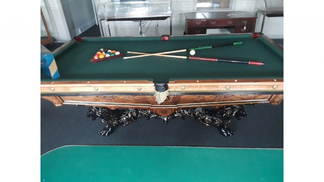 Brunswick Monarch Pool Table: Very Best Brunswick Monarch pool table with cast iron base and lion detailing on base. 102" x 55" x 34"Provenance Tyler Perry