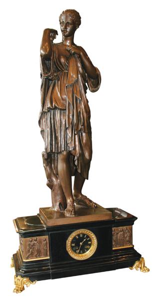 Bronze mantel clock: Fine mantel clock with monumental Barbedienne classically robed bronze lady statue on black marble base with gold paw feet. 42"H x 20"W