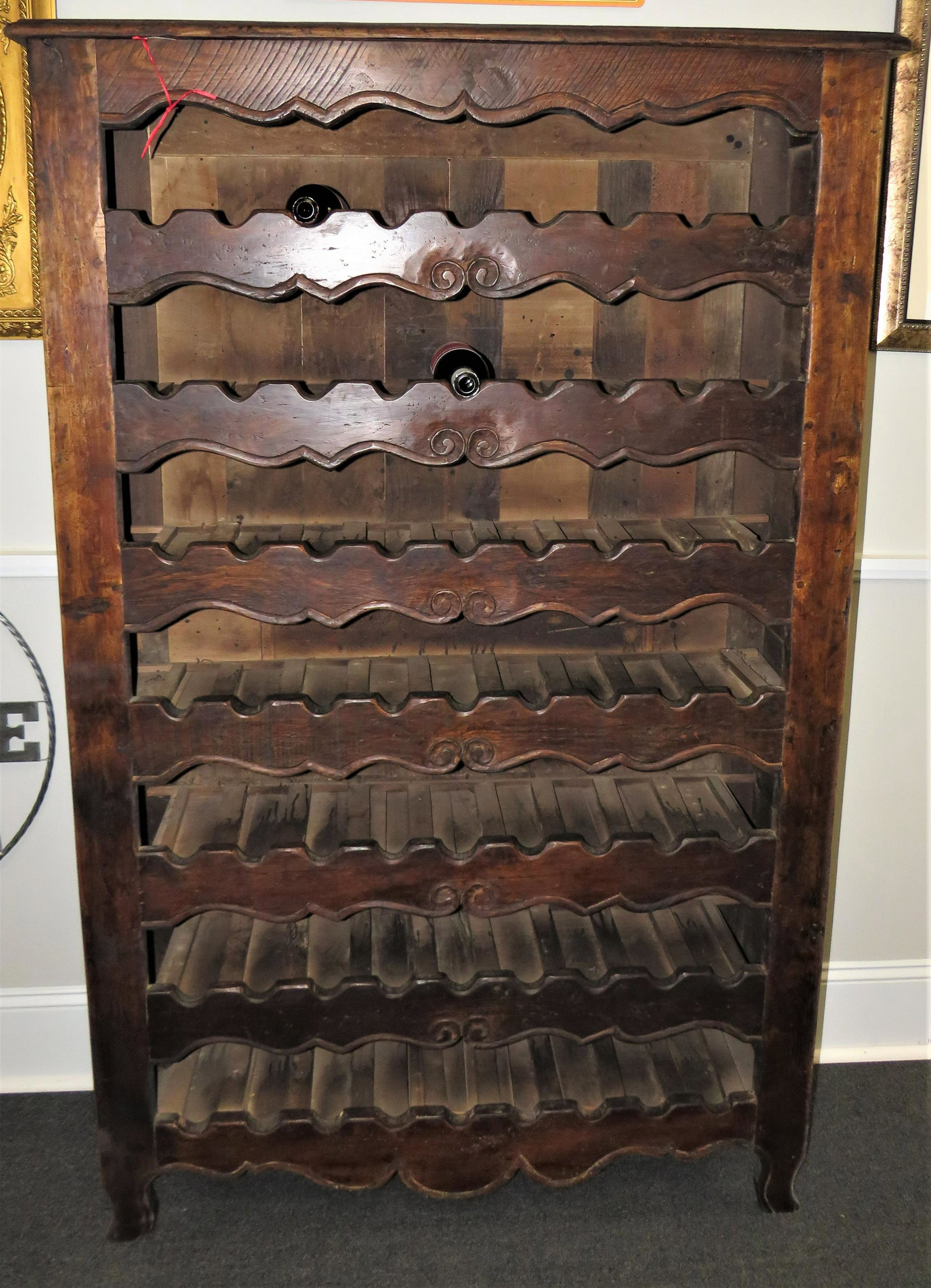 Antique French Provincial wine cabinet: Antique French Provincial wine Cabinet fitted with 7 rows of bottle storage. 72" High x 44" Wide