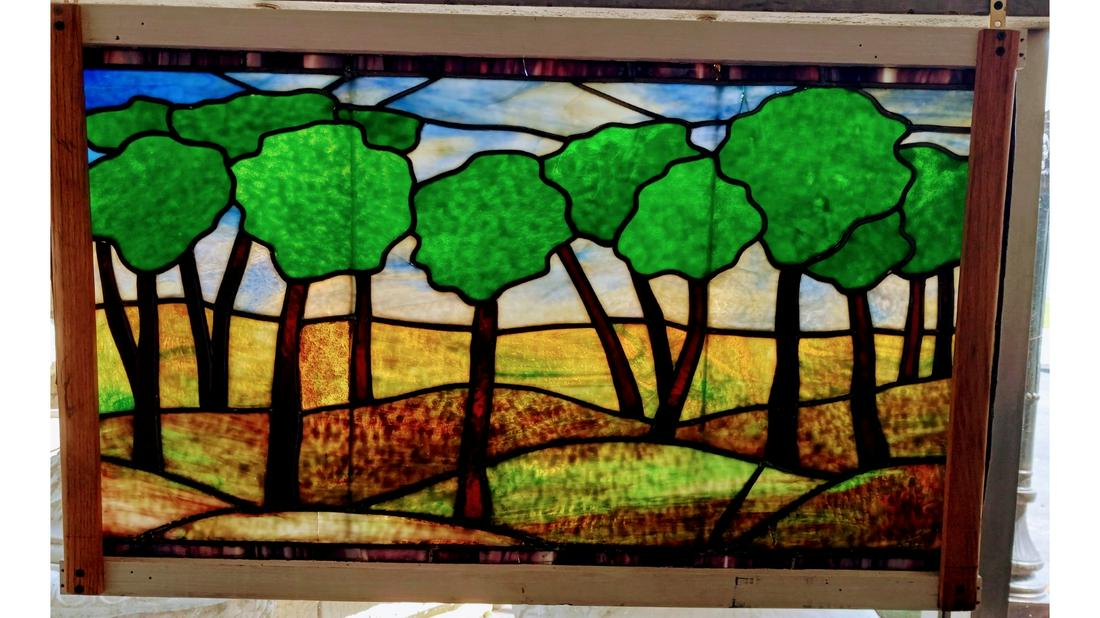 Stained glass window with trees with granite glass- American circa 1920. Unsigned attributed to: Stained glass window with trees with granite glass- American circa 1920. Unsigned attributed to Duffner. 23.5"H x 38"W