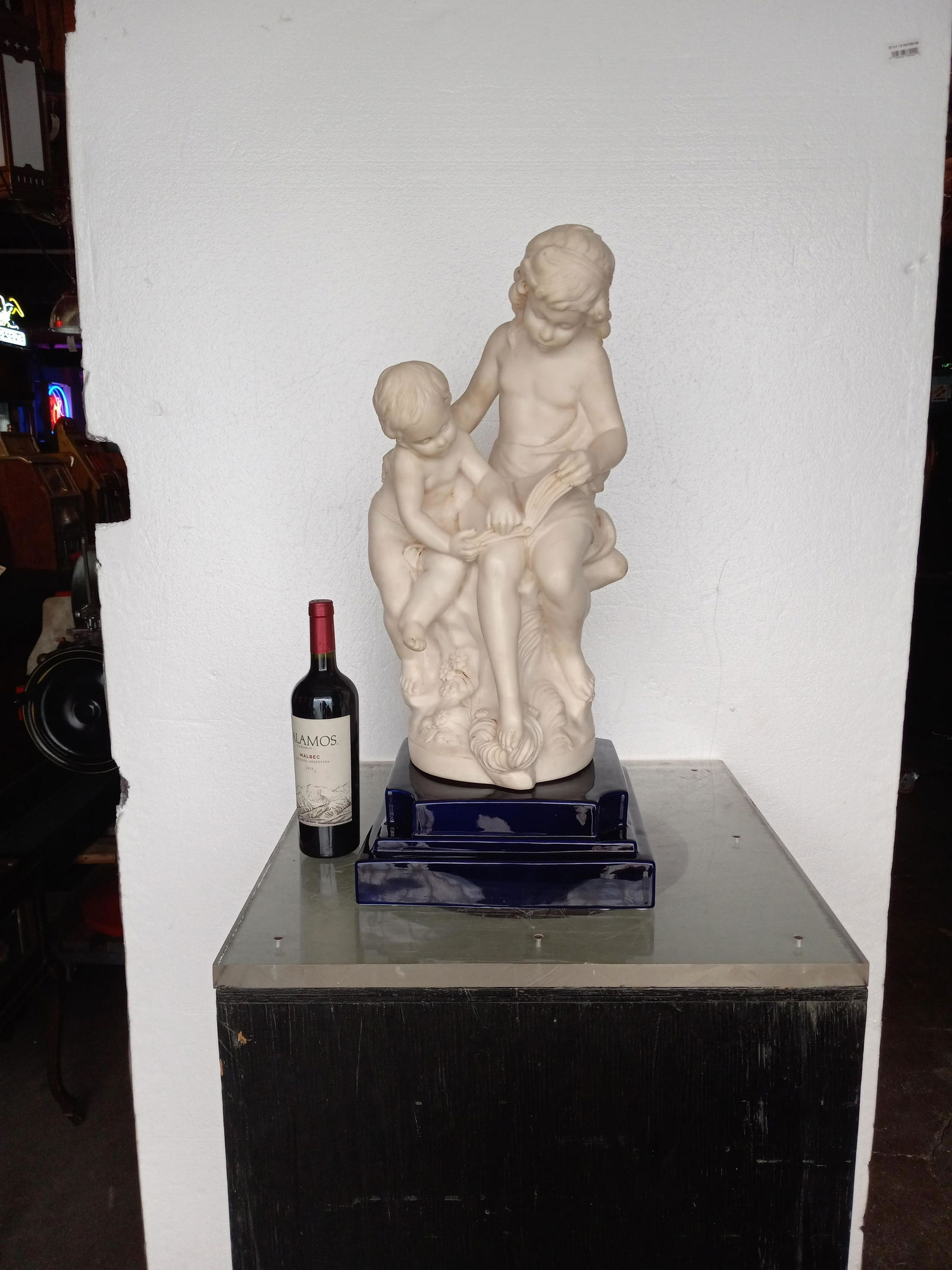 Sculpture of girl reading to a child. (1 of 6)