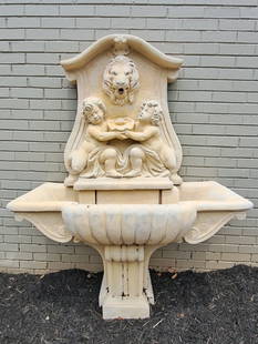 Lion Head Wall Fountain in Cast Stone: Large Outdoor Wall Fountain With Lion Head and With Putti Holding a Bowl. 64" h x 46"W x 24"D
