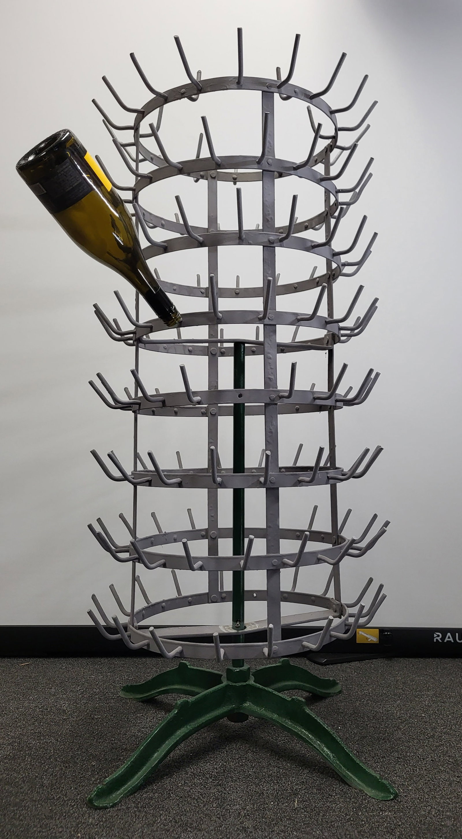 Vintage French Wine Bottle Drying Rack: A French bottle drying rack with multiple metal prongs and spinning base to convently add and air dry wine bottles. 42"H x 20"D