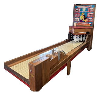 Bally's Vintage Bowling Game: Very rare vintage bowling game machine works great, plays up to 6 players equipped with original hand held balls. 76"h x 34"w x 134"d