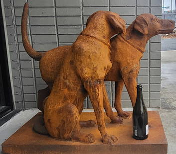 Cast Iron Hunting Dogs Group: An iron sculpture of two larger dogs one sitting and one standing grouped together peaceful and alert. 30"h x 24"w x 34"d