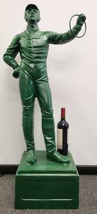 Cast Metal Lawn Jockey: Cast metal lawn jockey painted green. 45"H x 21"W on 13" Square base