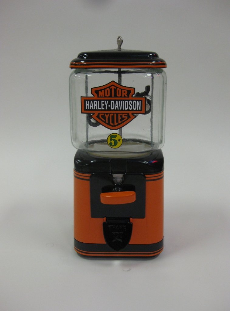 Harley Davidson Gumball Machine: Harley Davidson Gumball Machine. Good working condition. Circa 1950-1960. Overall Size: 16 1/4" x 6 1/8" x 7"