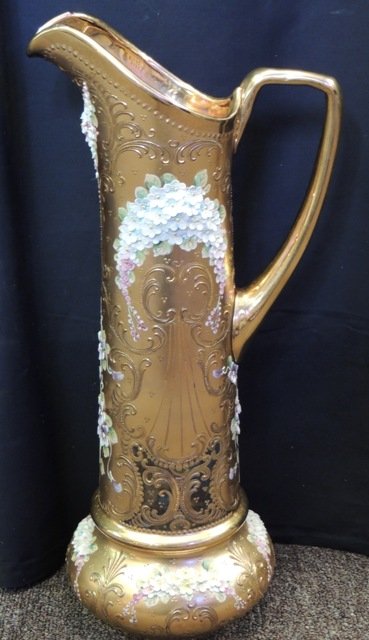 Rare Antique Murano Glass Pitcher: Are Antique Murano glass pitcher with porcelain floral detail. Dimensions: 20"h