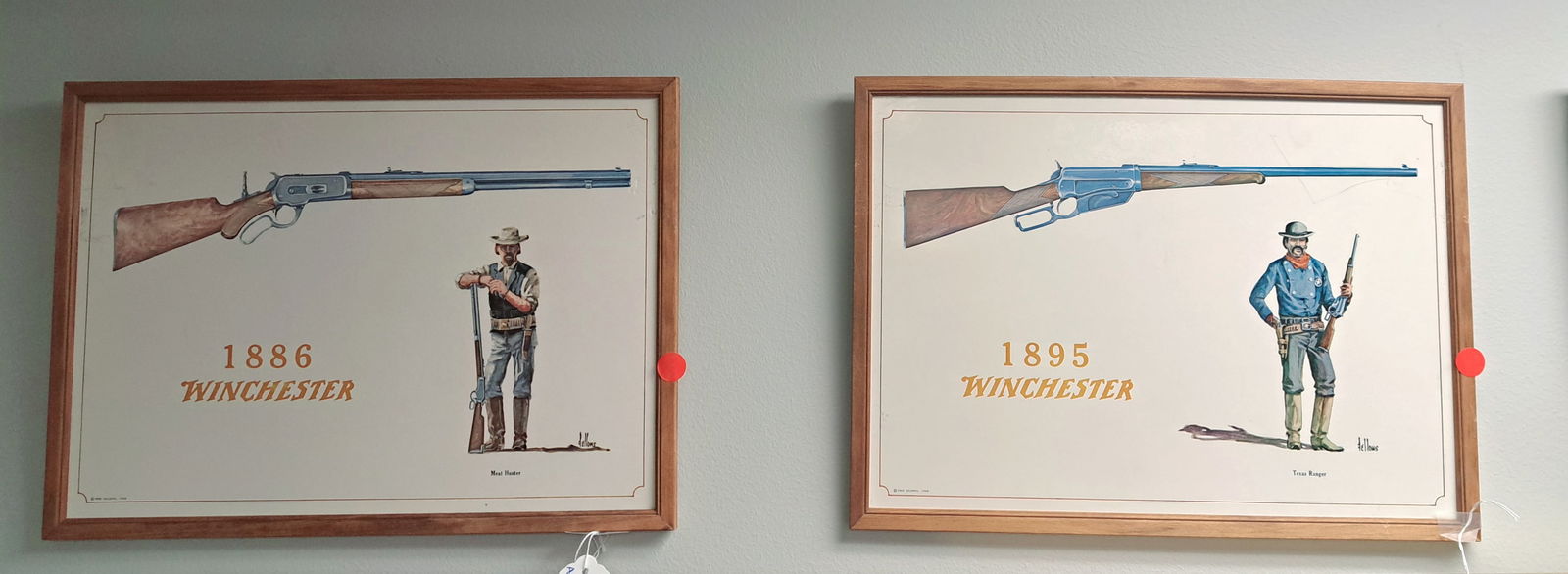 A Pair Of Fred Fellows Winchester Advertisements: Original pair of Painted Winchester "Shooters" advertisements featuring, "1886 Meat Hunter" the other "1895 Texas Ranger" pictured holding that year windchester rifle model Signed By Fred Fellows. 12"