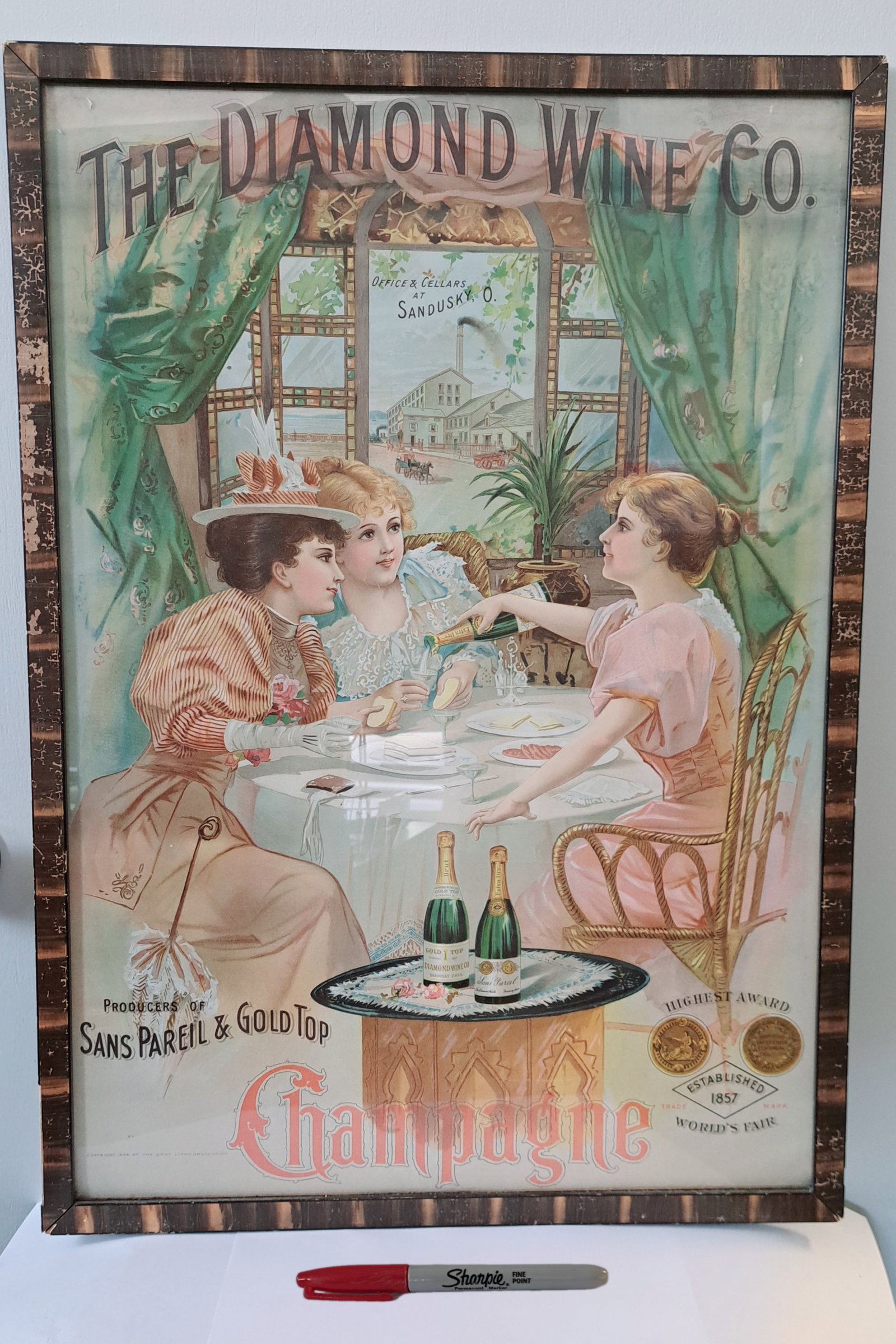 "The Diamond Wine Club" Framed Print: "The Diamond Wine Club" Three women sitting at a round table drinking afternoon champagne, set in the victorian age. From the Penny Marshall Collection. 28"h x 20"w
