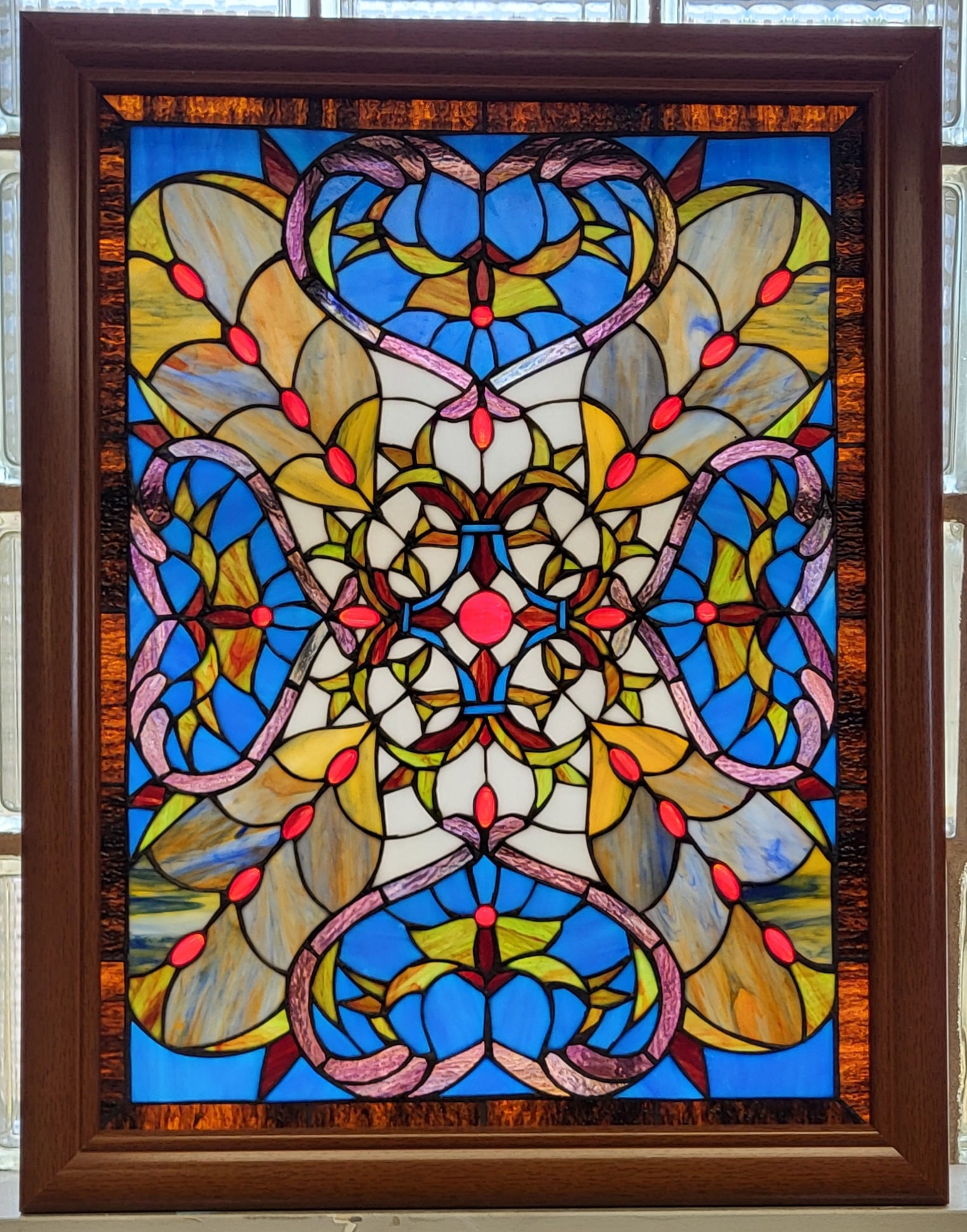 A Framed Multicolored stained glass window (1 of 2)